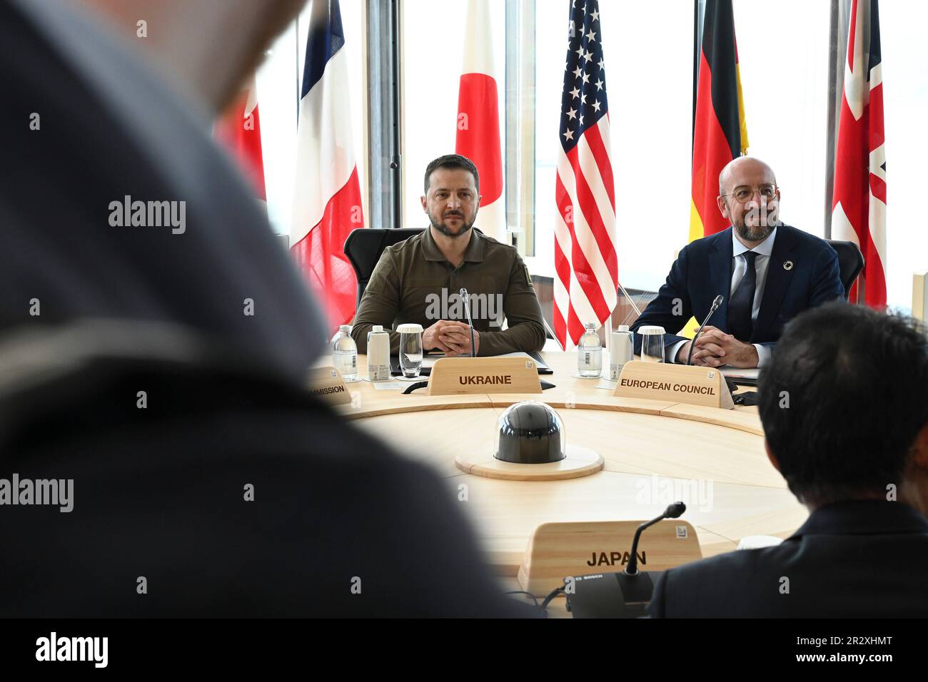 Hiroshima, Japan. 21st May, 2023. Ukrainian President Volodymyr Zelenskyy, center, attends a meeting with the leaders of the G7 group of nations at the G7 Leaders Summit at the Grand Prince Hotel, May 21, 2023 in Hiroshima, Japan. Sitting on the right is European Council President Charles Michel. Credit: Pool Photo/G7 Hiroshima/Alamy Live News Stock Photo