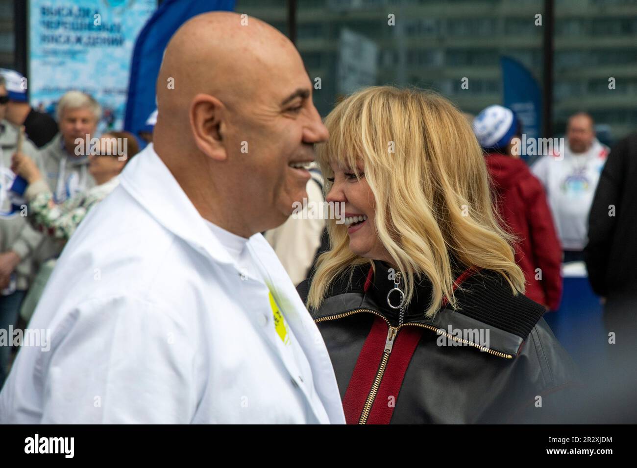 Moscow, Russia. 21st of May, 2023. The record producer Iosif Prigozhin and the singer Valeria arrives to plant out wild cherry trees in Dynamo Park to mark the Dynamo Moscow centenary as part of the Cherry Forest Festival in Moscow, Russia Stock Photo