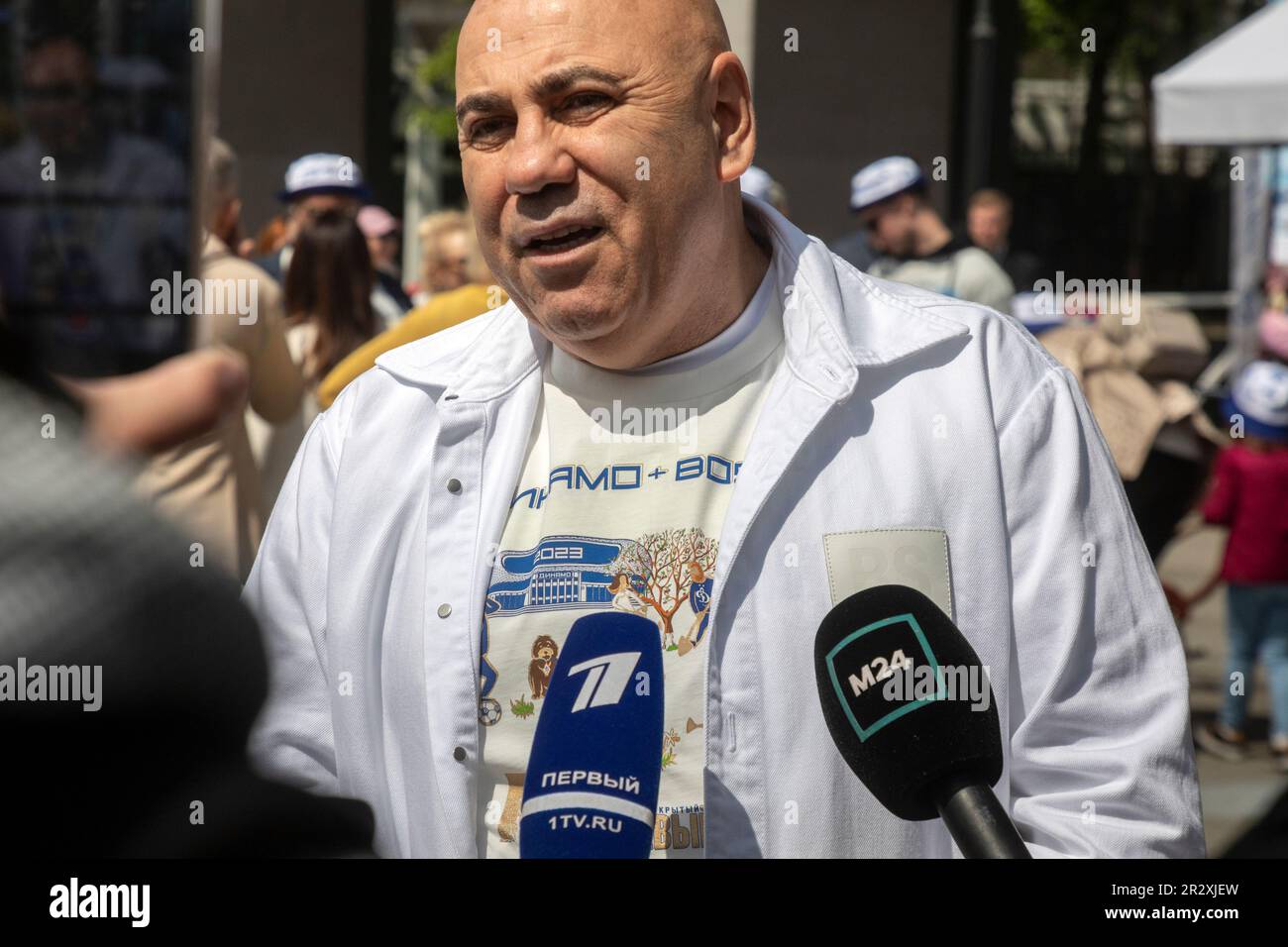 Moscow, Russia. 21st of May, 2023. Record producer Iosif Prigozhin arrives to plant out wild cherry trees in Dynamo Park to mark the Dynamo Moscow centenary as part of the Cherry Forest Festival in Moscow, Russia Stock Photo