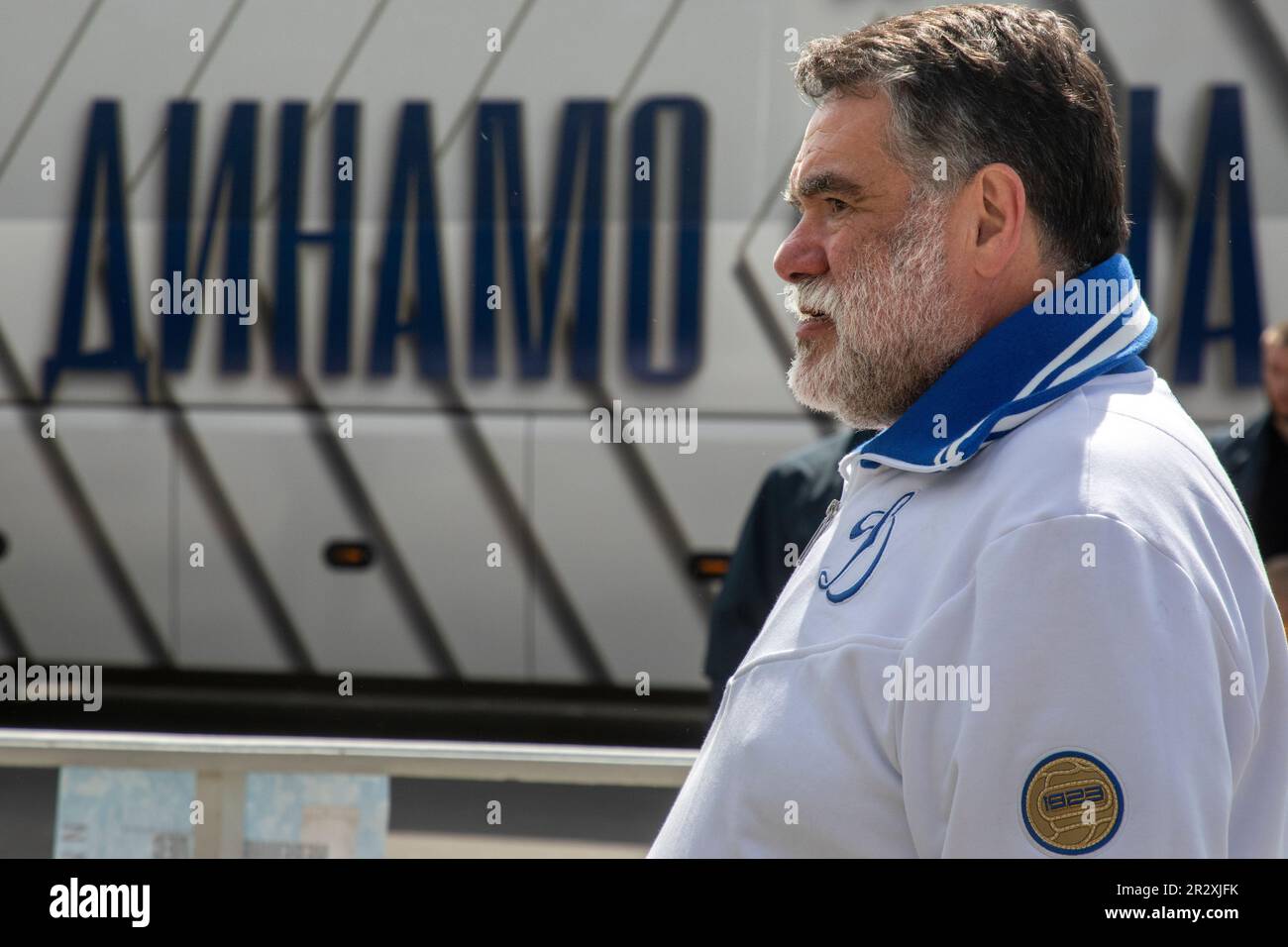Moscow, Russia. 21st of May, 2023. Bosco di Ciliegi President Mikhail Kusnirovich attends to plant out wild cherry trees in Dynamo Park to mark the Dynamo Moscow centenary as part of the Cherry Forest Festival in Moscow, Russia. The banner reads 'Dynamo' Stock Photo