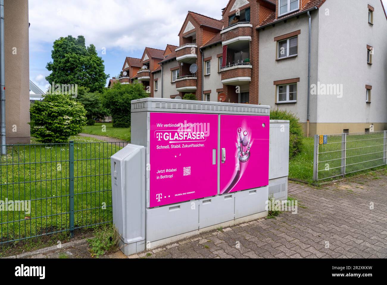 Distribution box for fibre optic technology, fast internet, of Deutsche Telekom, in a residential area in Bottrop-Eigen, NRW, Germany. Stock Photo