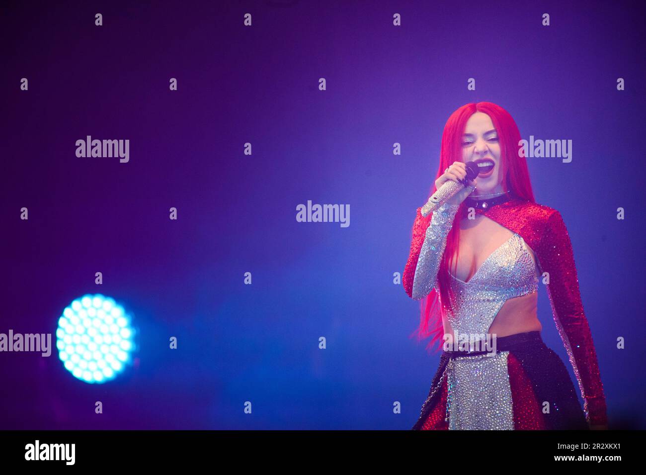 Hamburg, Germany. 21st May, 2023. Singer Ava Max sings into her microphone during one of two Germany concerts on stage at Hamburg's Stadtpark Open Air. Credit: Gregor Fischer/dpa/Alamy Live News Stock Photo