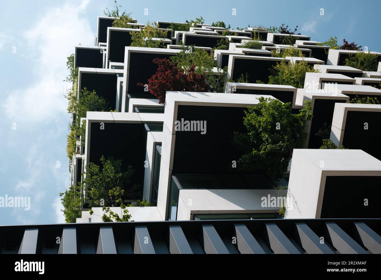 Sustainable and ecofriendly modern apartment building with balconies