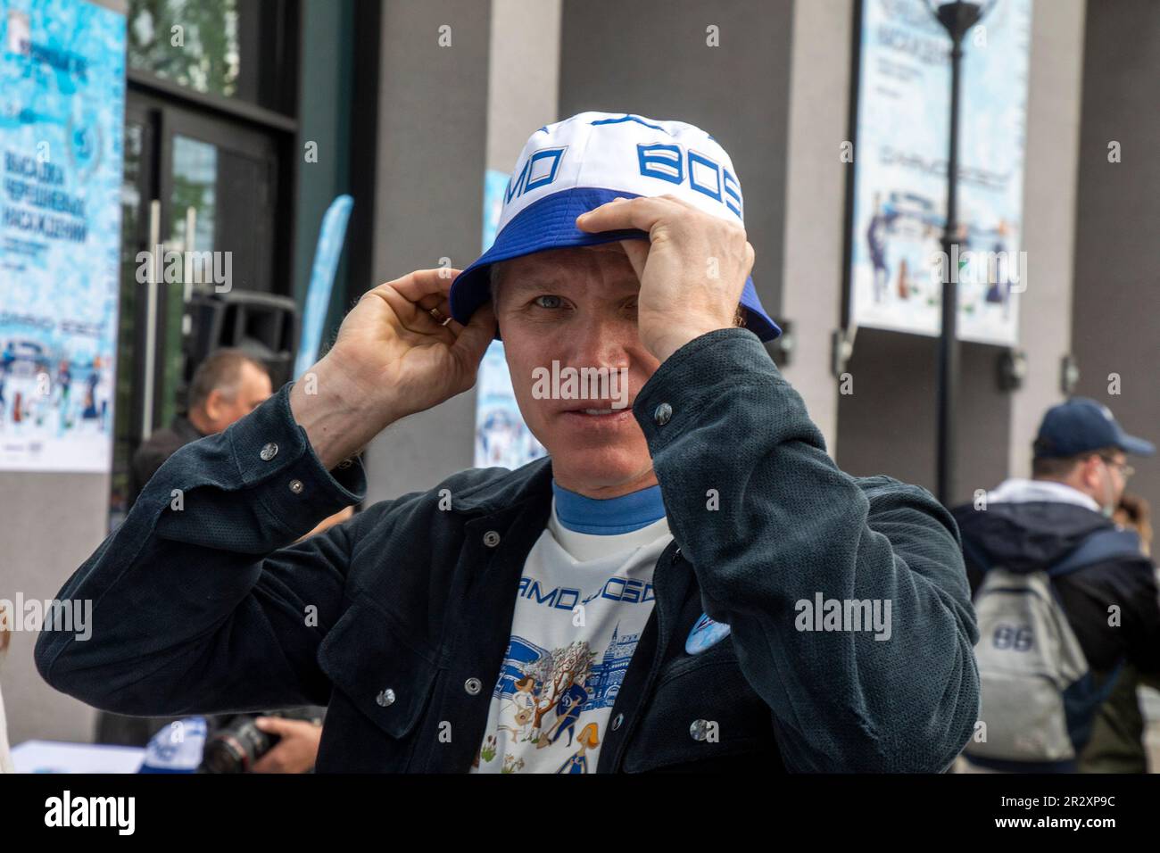 Moscow, Russia. 21st of May, 2023. Gapzrom Neft Deputy CEO Pavel Kolobkov plant out wild cherry trees in Dynamo Park to mark the Dynamo Moscow centenary as part of the Cherry Forest Festival in Moscow, Russia Stock Photo