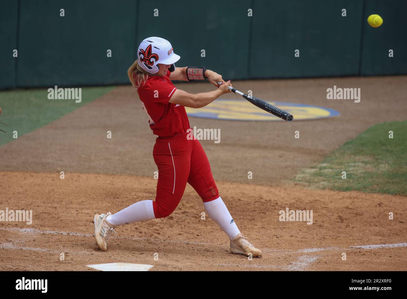 May 21, 2023 ULL's Alexa Langeliers (23) drives a home run during NCAA Regional Softball action