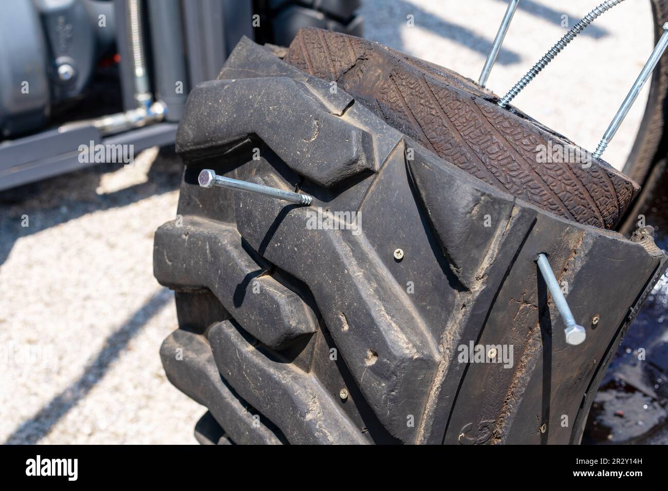 Agricultural machine wheel tire strength test Stock Photo Alamy