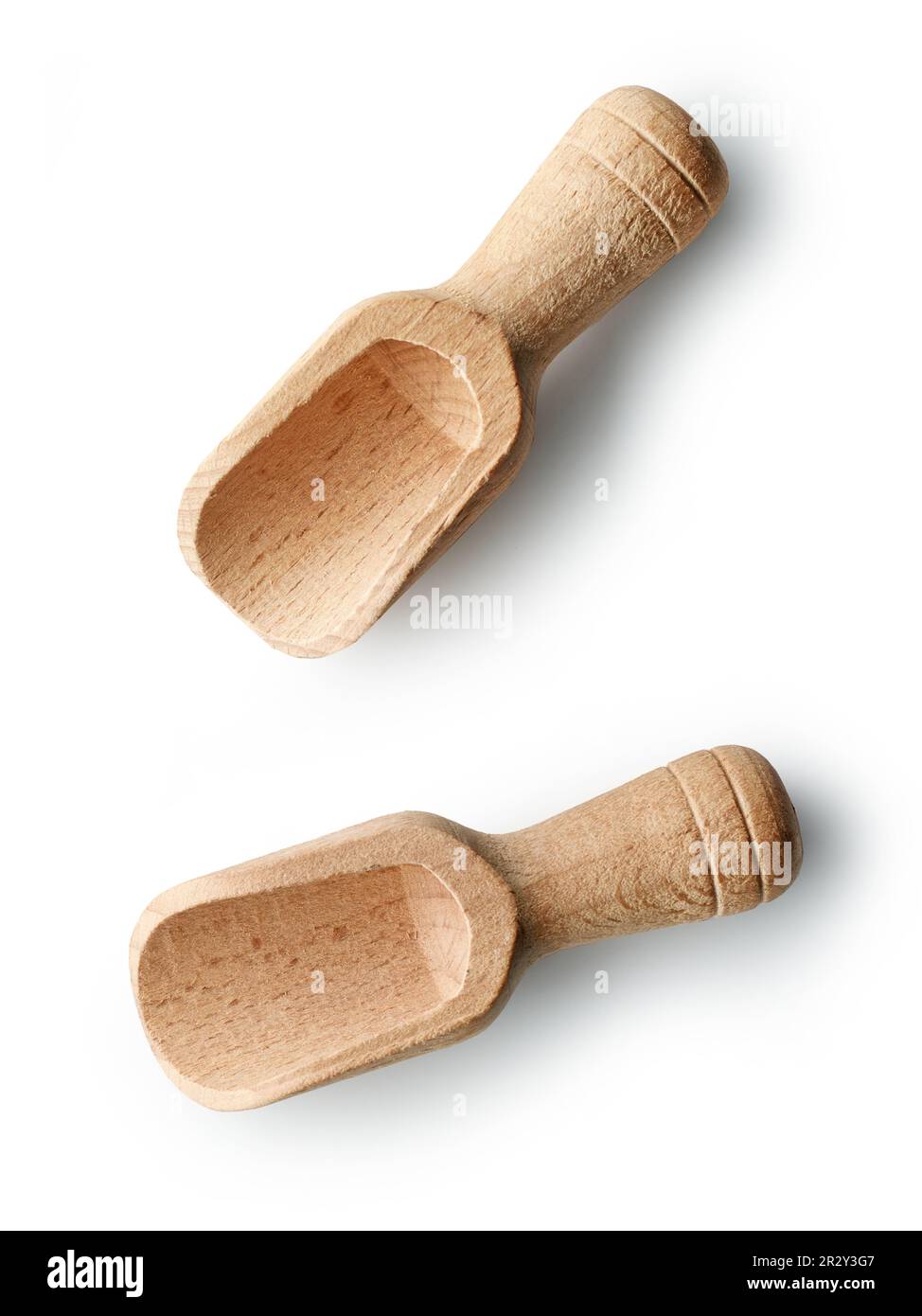 two empty wooden scoops isolated on white background, top view Stock Photo