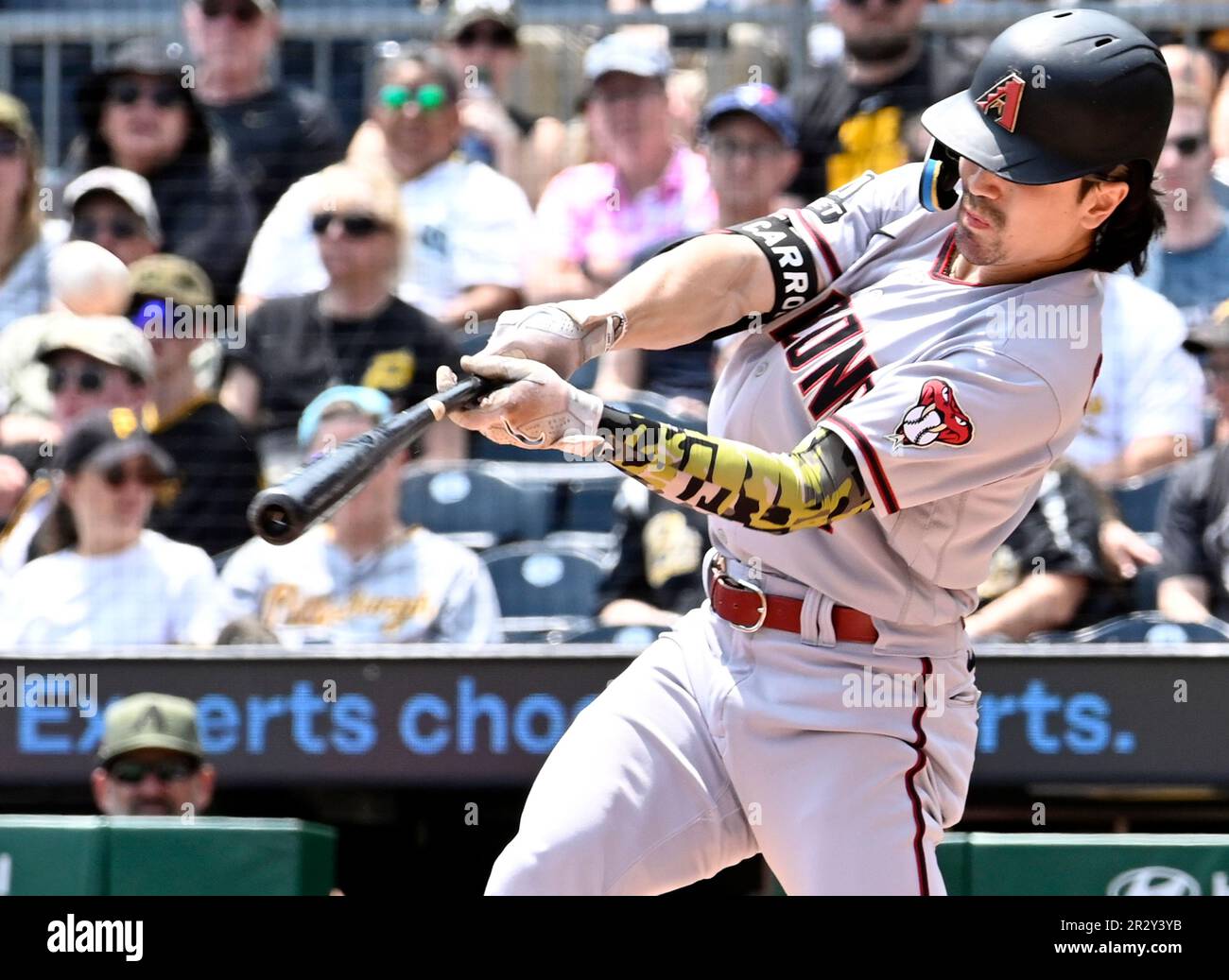 Corbin Carroll Arizona Diamondbacks Unsigned Black Jersey Swing Photograph