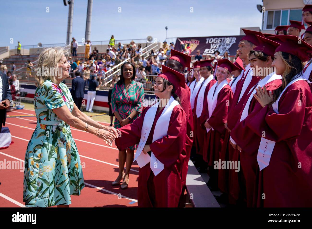 Hiroshima, Japan. 21st May, 2023. U.S. First Lady Jill Biden congratulates students during the graduation ceremony of M.C. Perry High School at Marine Corps Air Station Iwakuni, May 21, 2023 in Iwakuni, Yamaguchi Prefecture, Japan. Credit: Erin Scott/White House Photo/Alamy Live News Stock Photo