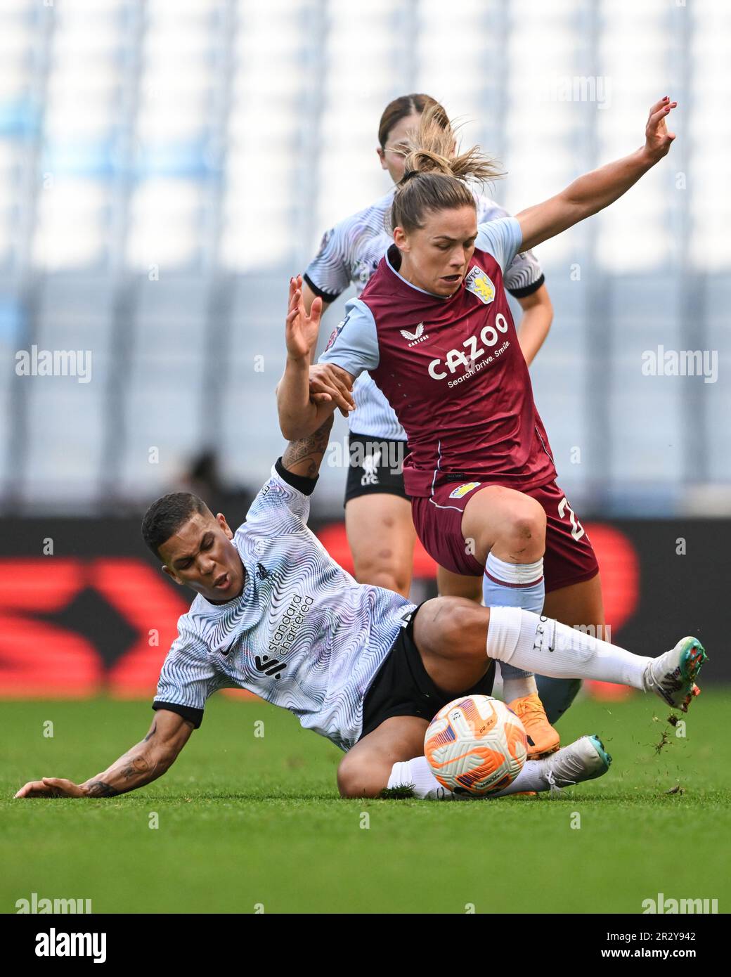 Birmingham, UK. 21st May 2023.   Kirsty Hanson of Aston Villa is tackled by Shanice van de Sanden of Liverpool during the WomenÕs Super League match between Aston Villa and Liverpool at Villa Park in Birmingham on 21st May 2023. This image may only be used for Editorial purposes. Editorial use only.  Credit: Ashley Crowden/Alamy Live News Stock Photo