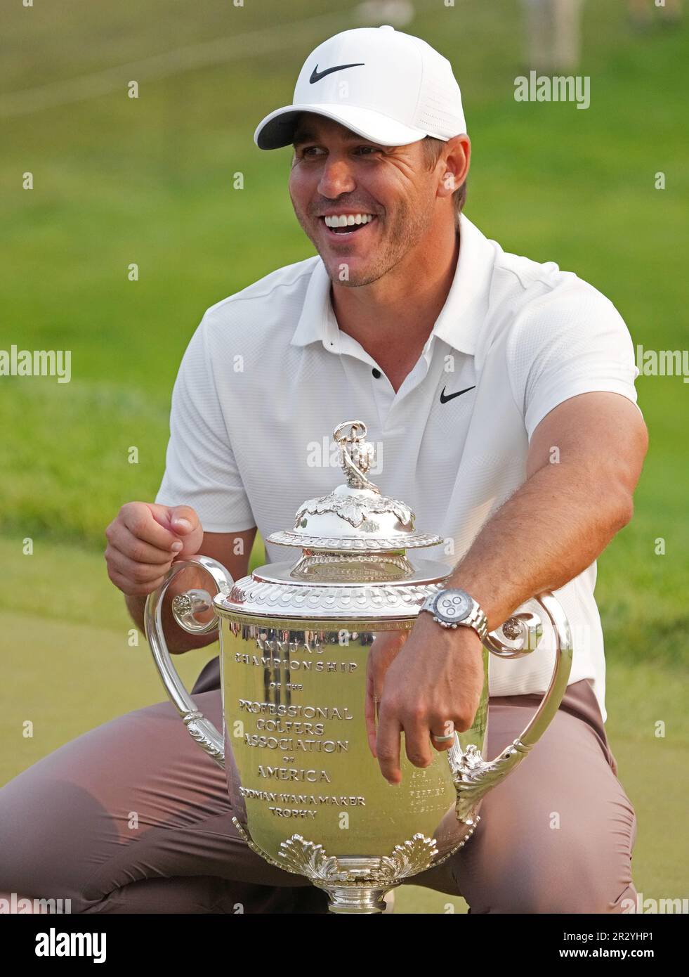 Rochester, United States. 21st May, 2023. Brooks Koepka poses with his trophy after winning the 2023 PGA Championship at Oak Hill Country Club in Rochester, New York on Sunday, May 21, 2023. Koepka shot 72, 66, 66 and 67 to finish at nine-under-par. Photo by Aaron Josefczyk/UPI Credit: UPI/Alamy Live News Stock Photo