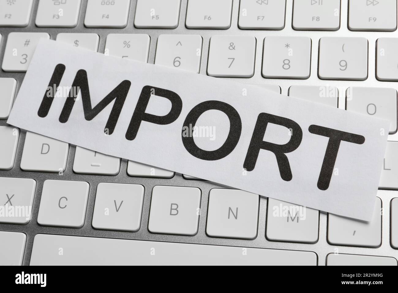 Card with word Import on computer keyboard, closeup Stock Photo