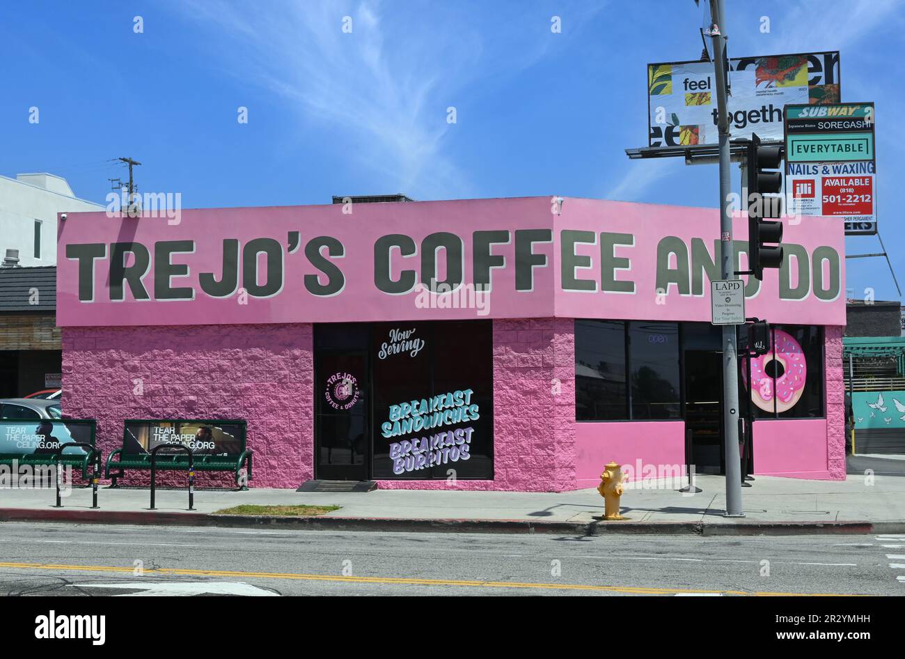 LOS ANGELES, CALIFORNIA - 12 MAY 2023: Trejos Coffee and Donuts, owned by actor Danny Trejo, on the corner of Santa Monica Boulevard and Highland Aven Stock Photo