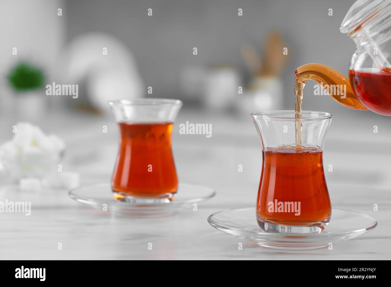 Turkish tea pot with glass of tea Stock Photo - Alamy