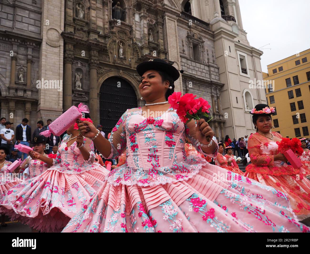Lima, Peru. 21st May, 2023. Group of women performing when Peruvian Indigenous folk dancers wearing traditional costumes from the Andean regions took to the streets of Lima downtown again, as they used to do every Sunday before the pandemic, to spread their colorful dances and ancestral traditions. Credit: Fotoholica Press Agency/Alamy Live News Stock Photo