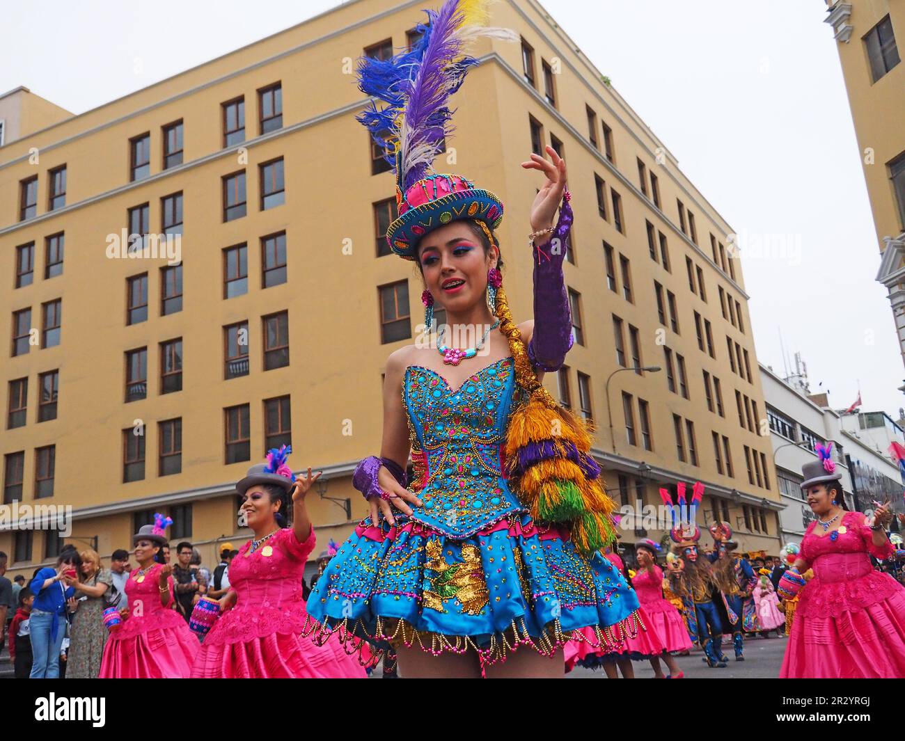 Lima, Peru. 21st May, 2023. Group of women performing when Peruvian Indigenous folk dancers wearing traditional costumes from the Andean regions took to the streets of Lima downtown again, as they used to do every Sunday before the pandemic, to spread their colorful dances and ancestral traditions. Credit: Fotoholica Press Agency/Alamy Live News Stock Photo
