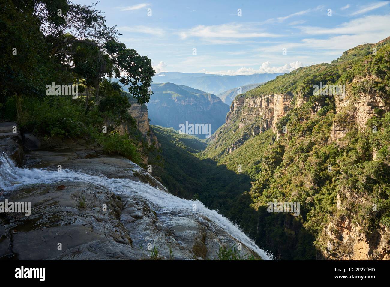 Majestic mountain scenery, view from the top of the Manchego waterfall, which falls into the Chicamocha canyon, in Aratoca, Santander, Colombia. Stock Photo