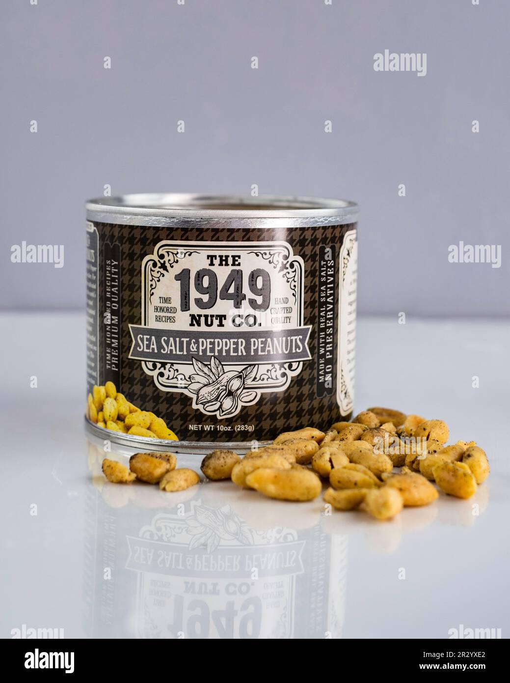 Can of 1949 Nut Co. brand of sea salt & pepper peanuts, a specialty peanut product. USA. Stock Photo