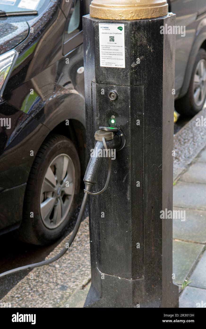 London, UK - May, 10, 2023 : Siemens Ubitricity charging point lamp post in London. UK. EV charging station lamppost. Stock Photo
