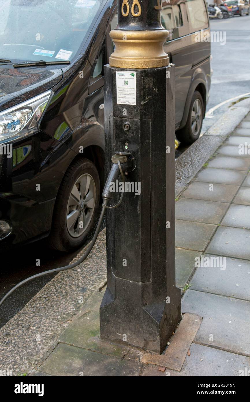 London, UK - May, 10, 2023 : Siemens Ubitricity charging point lamp post in London. UK. EV charging station lamppost. Stock Photo