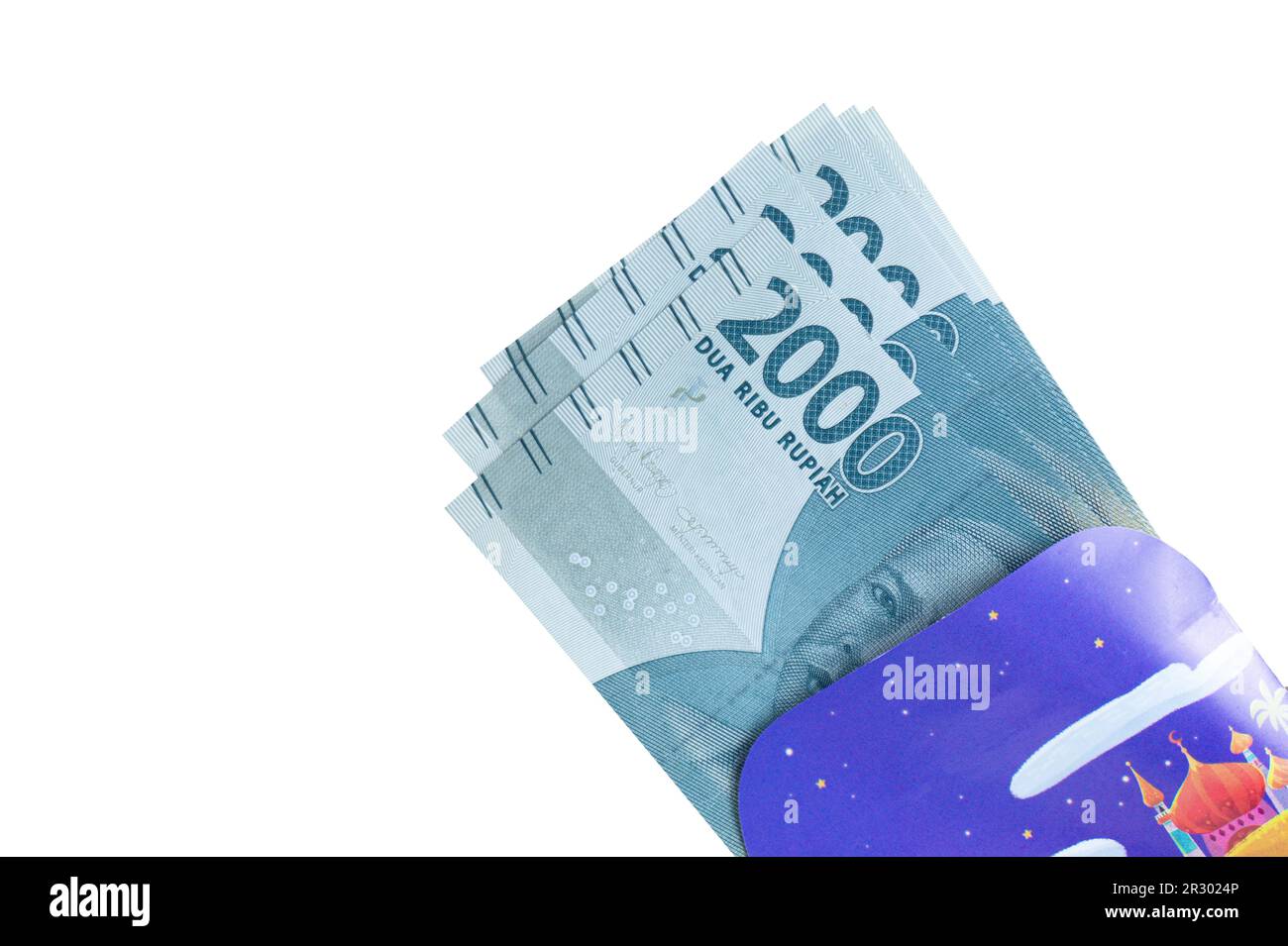 hand holding rupiah money and envelope isolated on white background Stock Photo