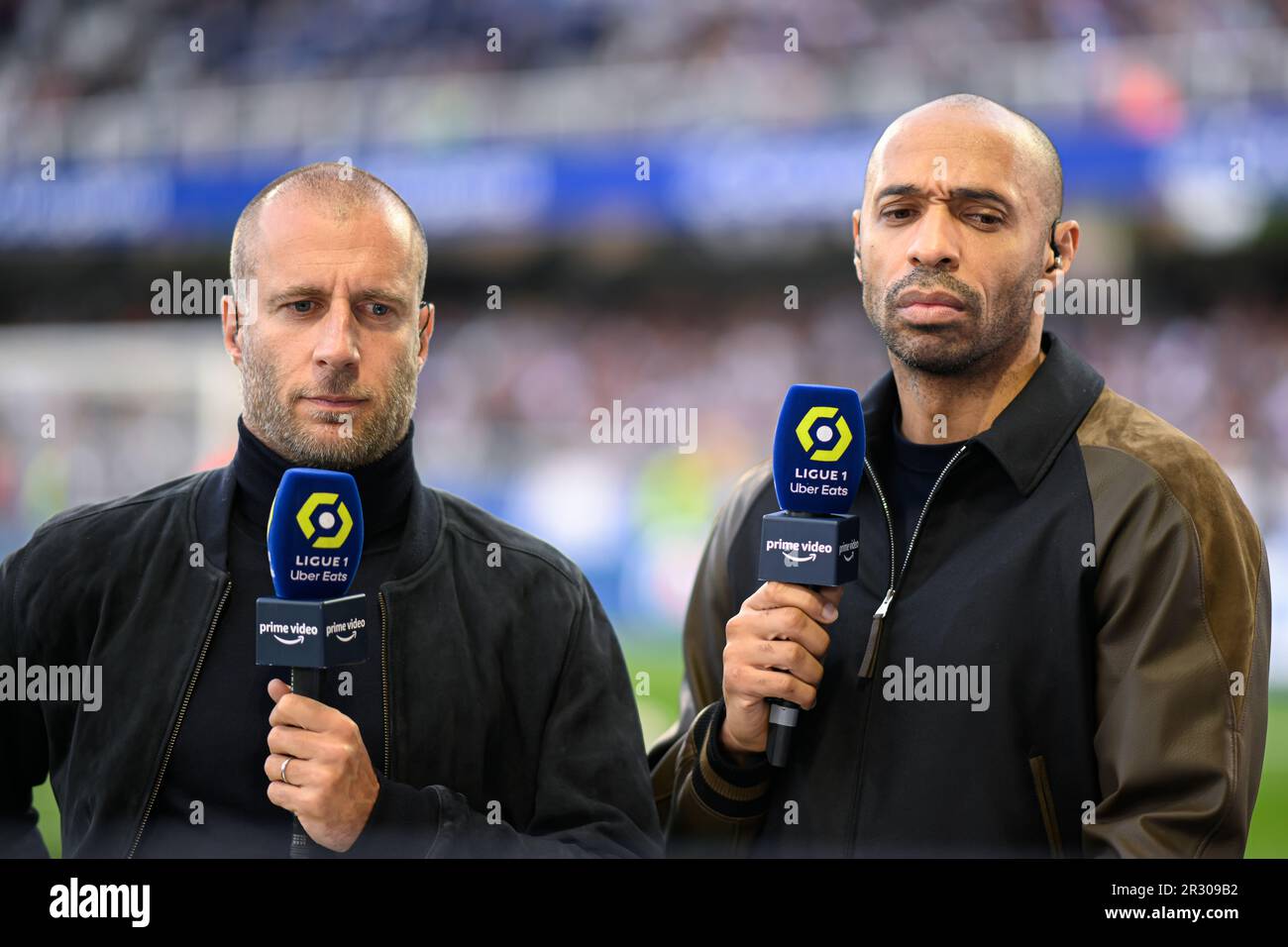 Paris, France. 21st May, 2023. Thierry Henry, consultant for Amazon Prime  Video channel, and Benoit Cheyrou during the Ligue 1 Uber Eats football  (soccer) match between AJ Auxerre (AJA) and Paris Saint