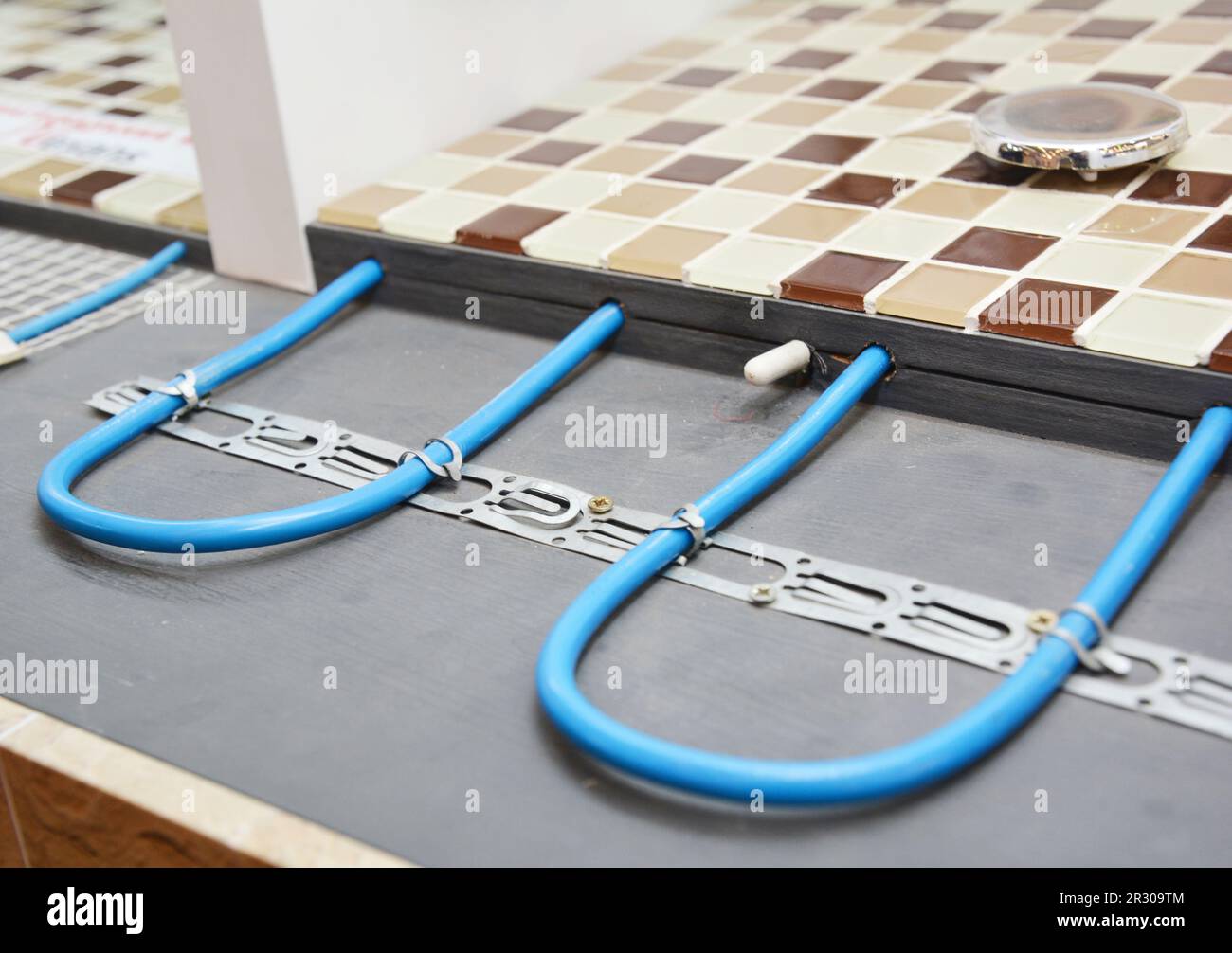 Electric Radiant Flooring Installation Concept. Installing radiant heat