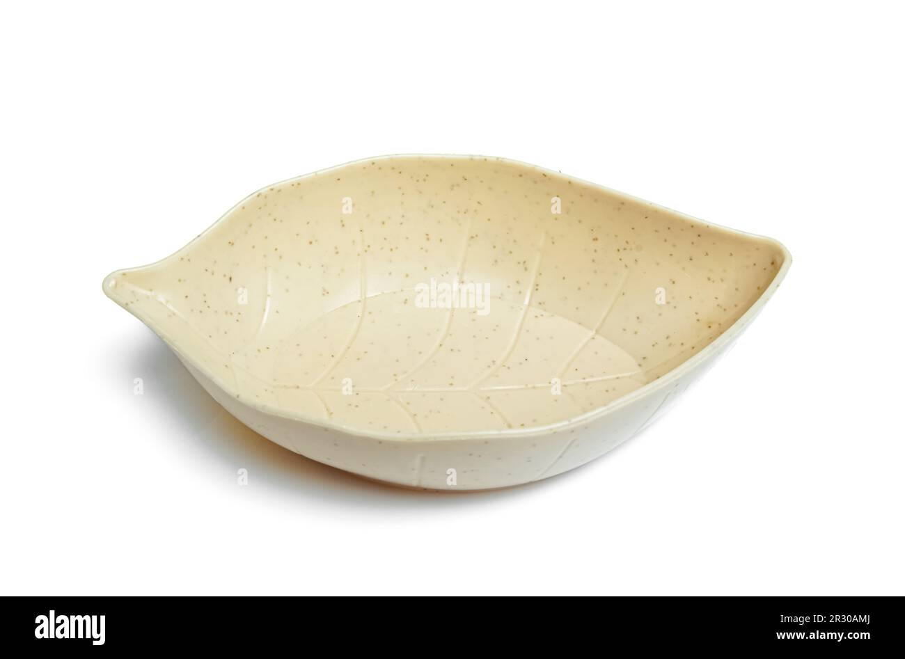 a serving bowl in the shape of a leaf isolated on white background Stock Photo Alamy