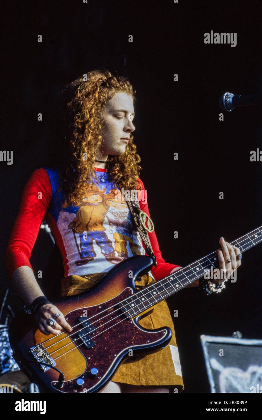 Reading, UK, 26 Aug., 1994: Pictured is Melissa Auf der Maur, bassist for Hole. The band made their Reading Festival debut on Friday, 26 August, 1994. It was front-woman Courtney Love’s first public appearance since the death of husband Curt Kobain five months previously and just two months after the death of Hole’s bassist, Kristen Pfaff, from an overdose. Founded as the National Jazz Festival in 1961, the festival moved to its permanent home at Little John's Farm in Reading in 1971 and is held over the UK’s August bank holiday weekend. Stock Photo