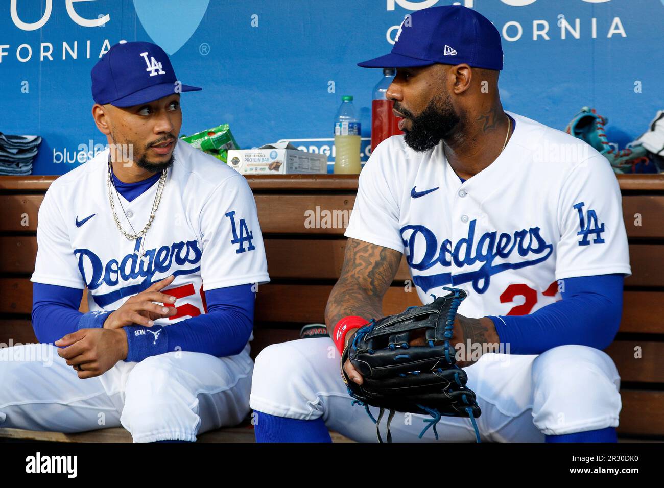 LOS ANGELES, CA - MAY 16: Los Angeles Dodgers second basemen Mookie Betts  (50) talks with right fielder Jason Heyward (23) in the dugout prior to a  regular season game between the