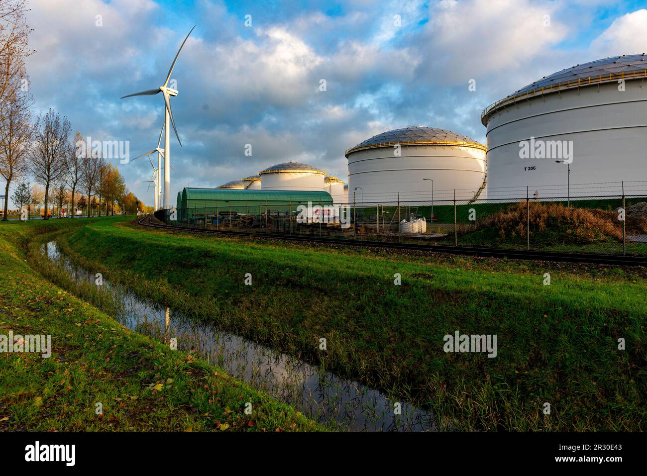 Amsterdam, Netherlands. Fossil Fuels & Chemical Storage Tanks of Evos Amsterdam West BV, contributing to Climate Change, Climate Crisis and CO2 Emissions. Stock Photo