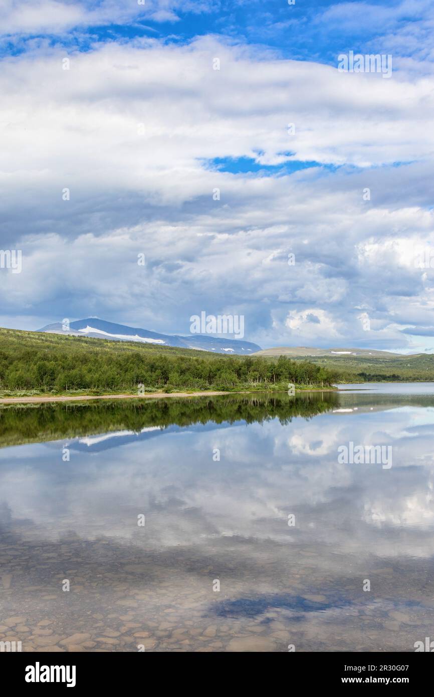 Lake with water reflections in the Swedish mountains Stock Photo