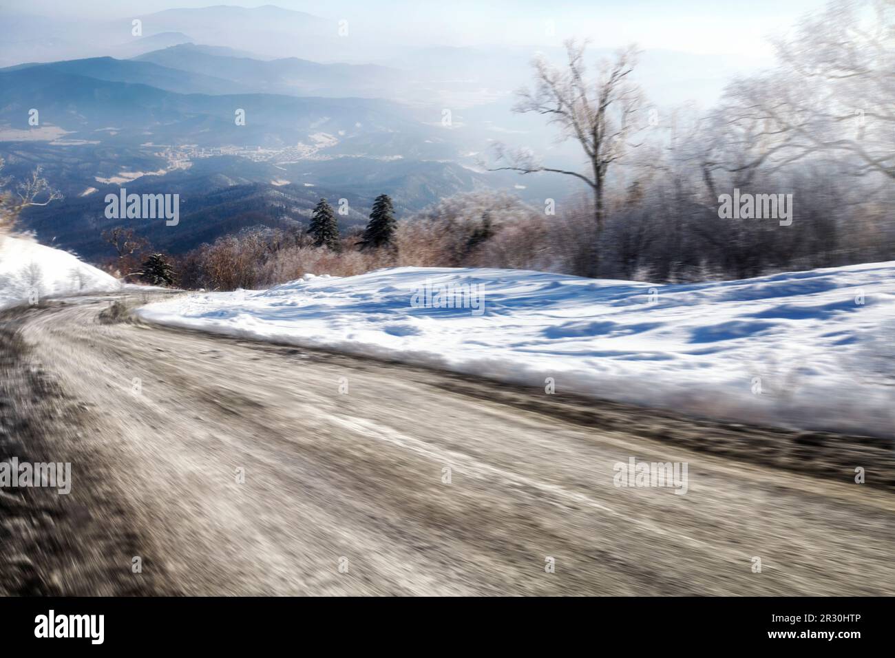 Snow-covered road in Heilungkiang province,China Stock Photo