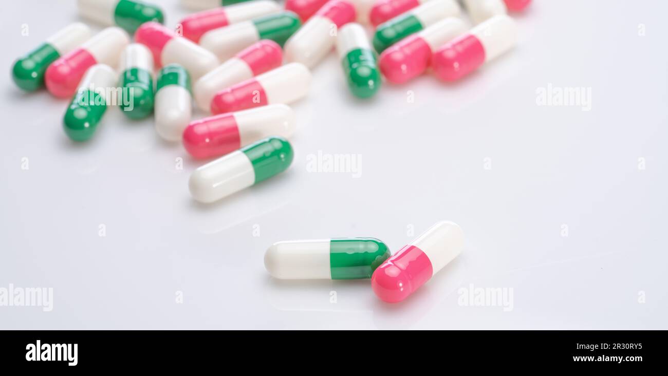 Capsules pill spread on white background. Prescription drugs. Capsule