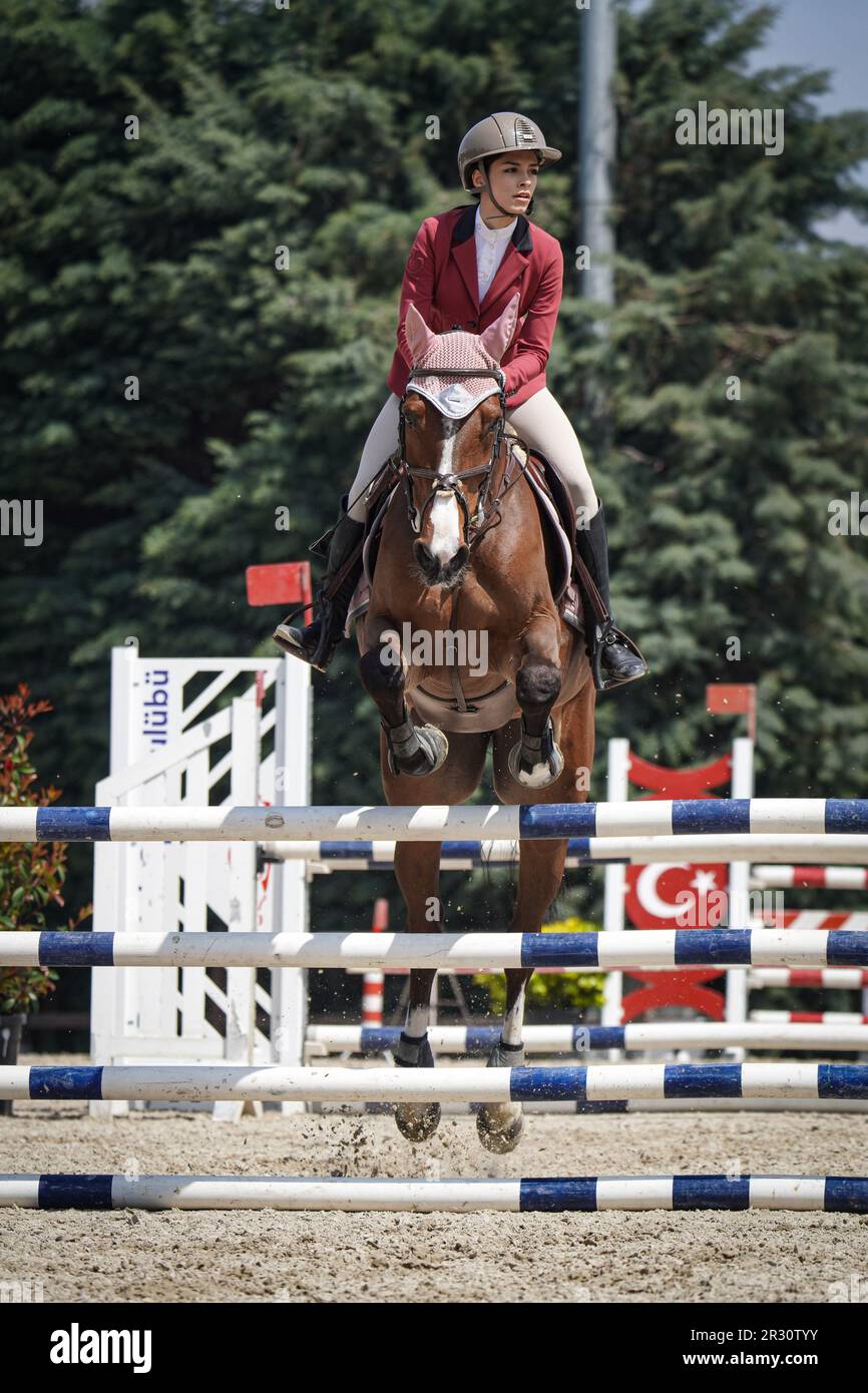 BURSA, TURKIYE APRIL 08, 2023 Unidentified rider jumps with horse
