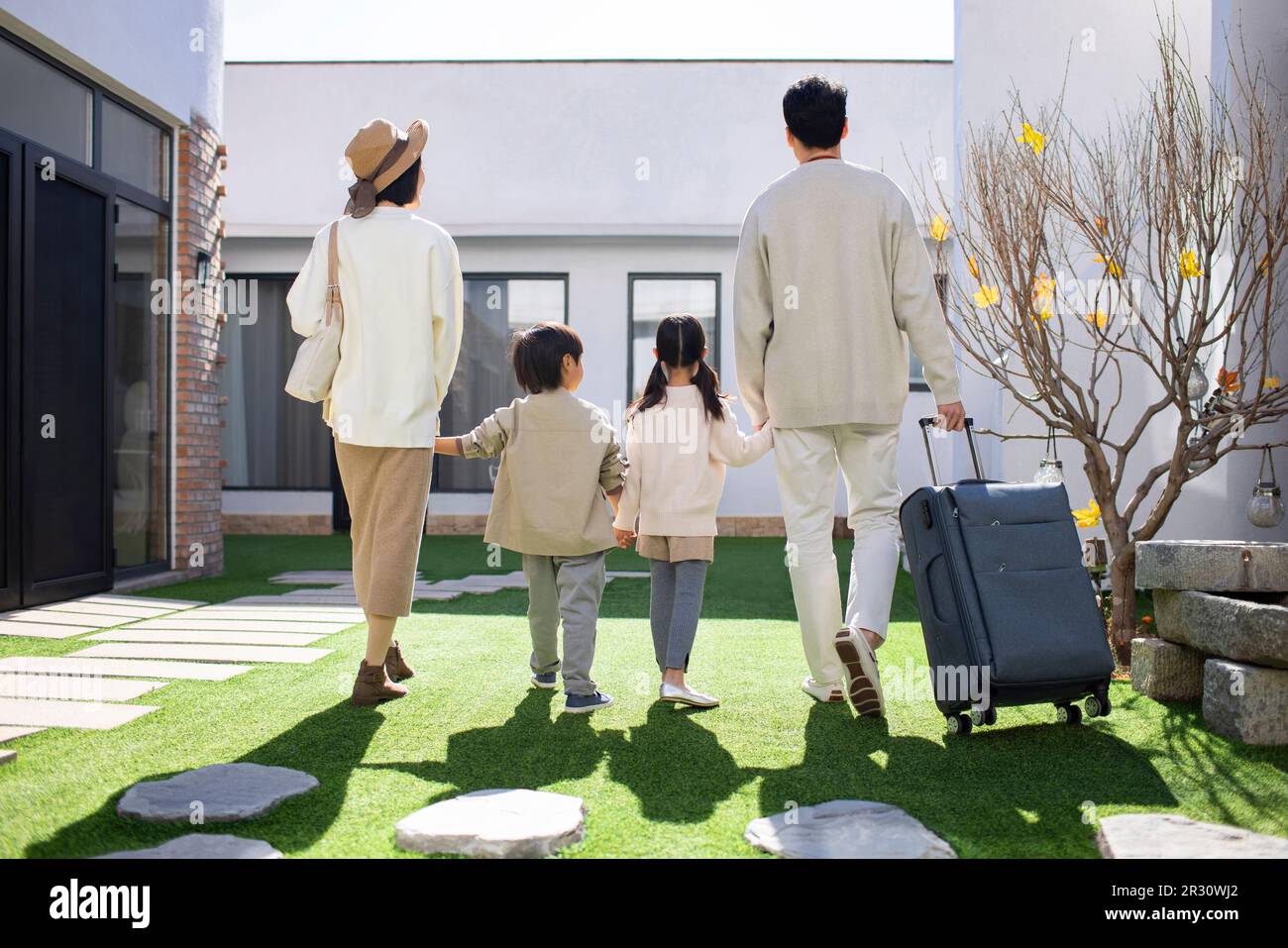 Happy young Chinese family on vacation Stock Photo - Alamy