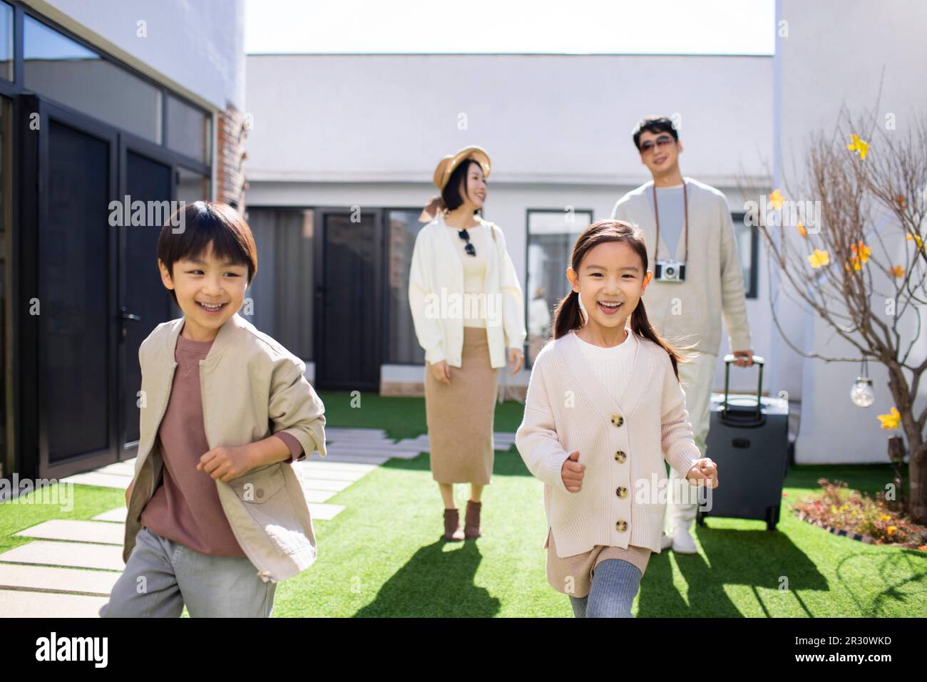 Happy young Chinese family on vacation Stock Photo - Alamy