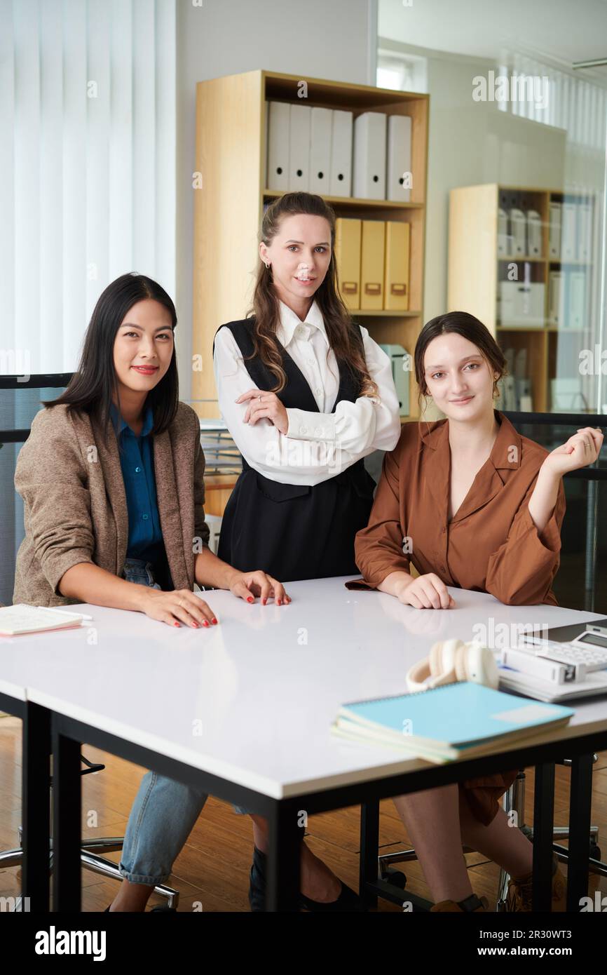 Successful team of businesswomen working in office Stock Photo