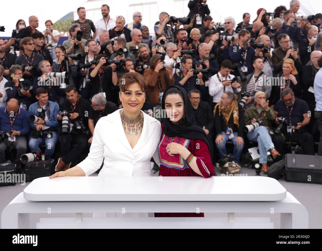 Director Sahra Mani, left, and Zahra pose for photographers at the