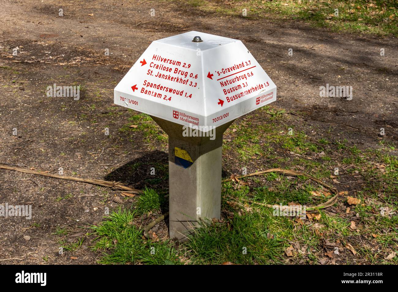 Route marker in shape of mushroom signpost designed for hikers and cyclists in Hilversum, Netherlands Stock Photo