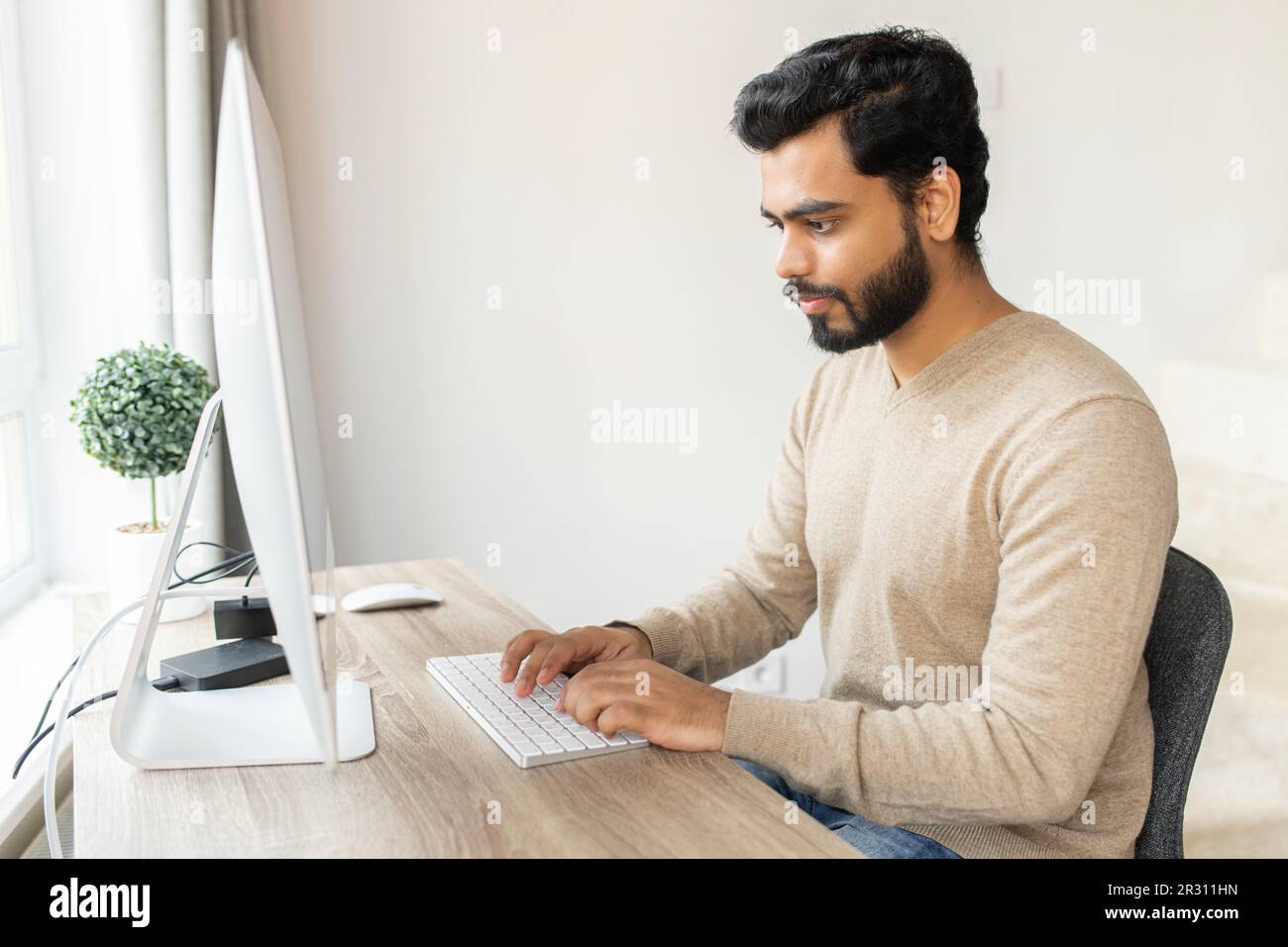 Learning english learning man computer hi-res stock photography and ...