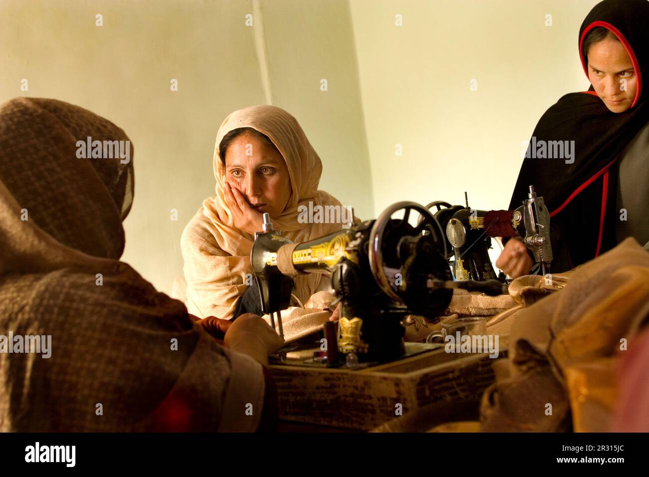 Women at work in sewing workroom in Kabul. Stock Photo