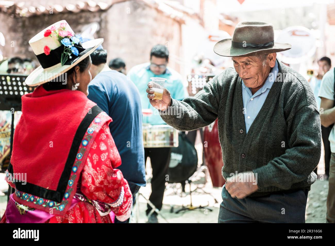 Peruvian older man dancing during a traditional religious celebration