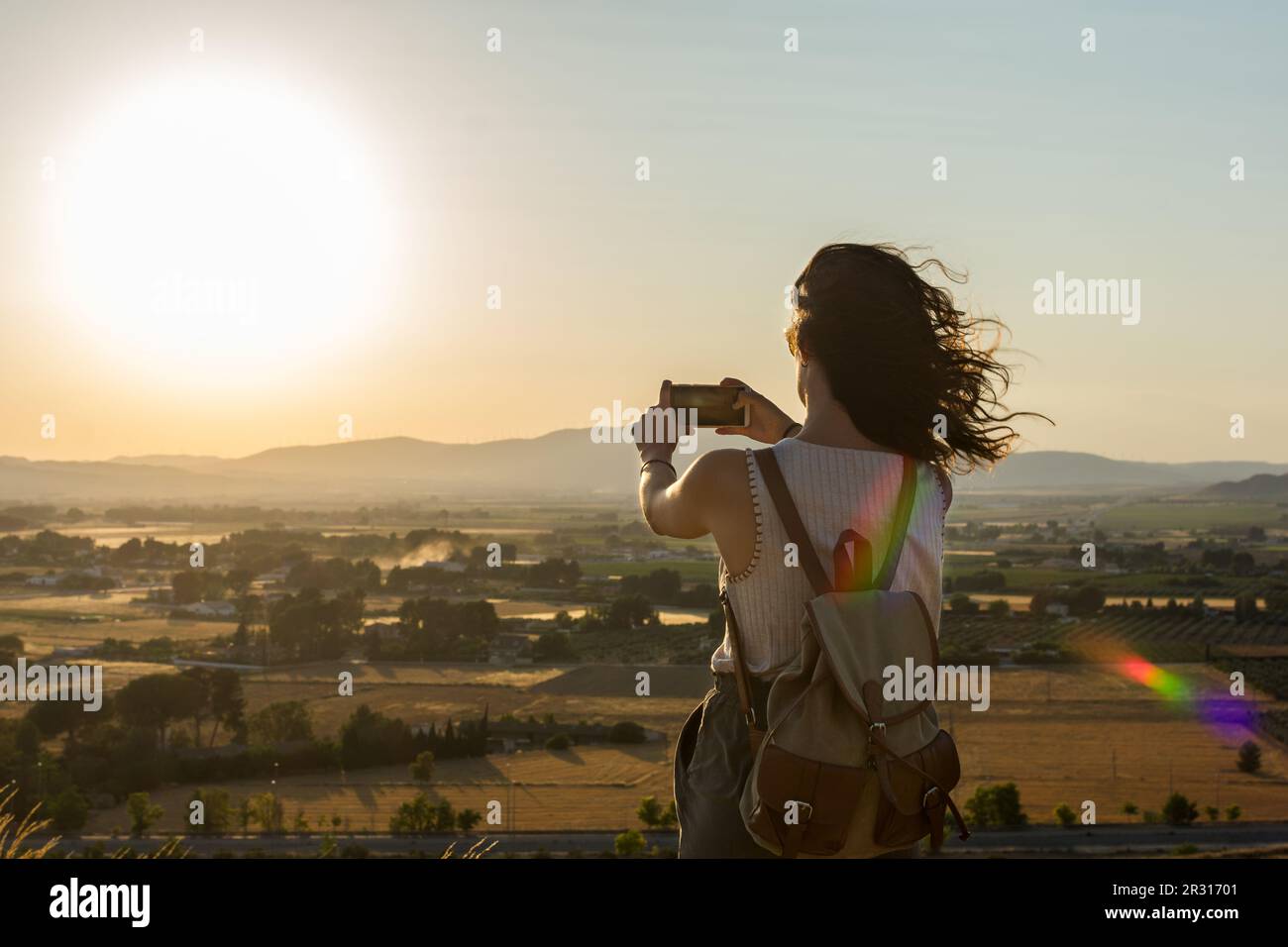 Woman take photo on mountain hi-res stock photography and images - Alamy