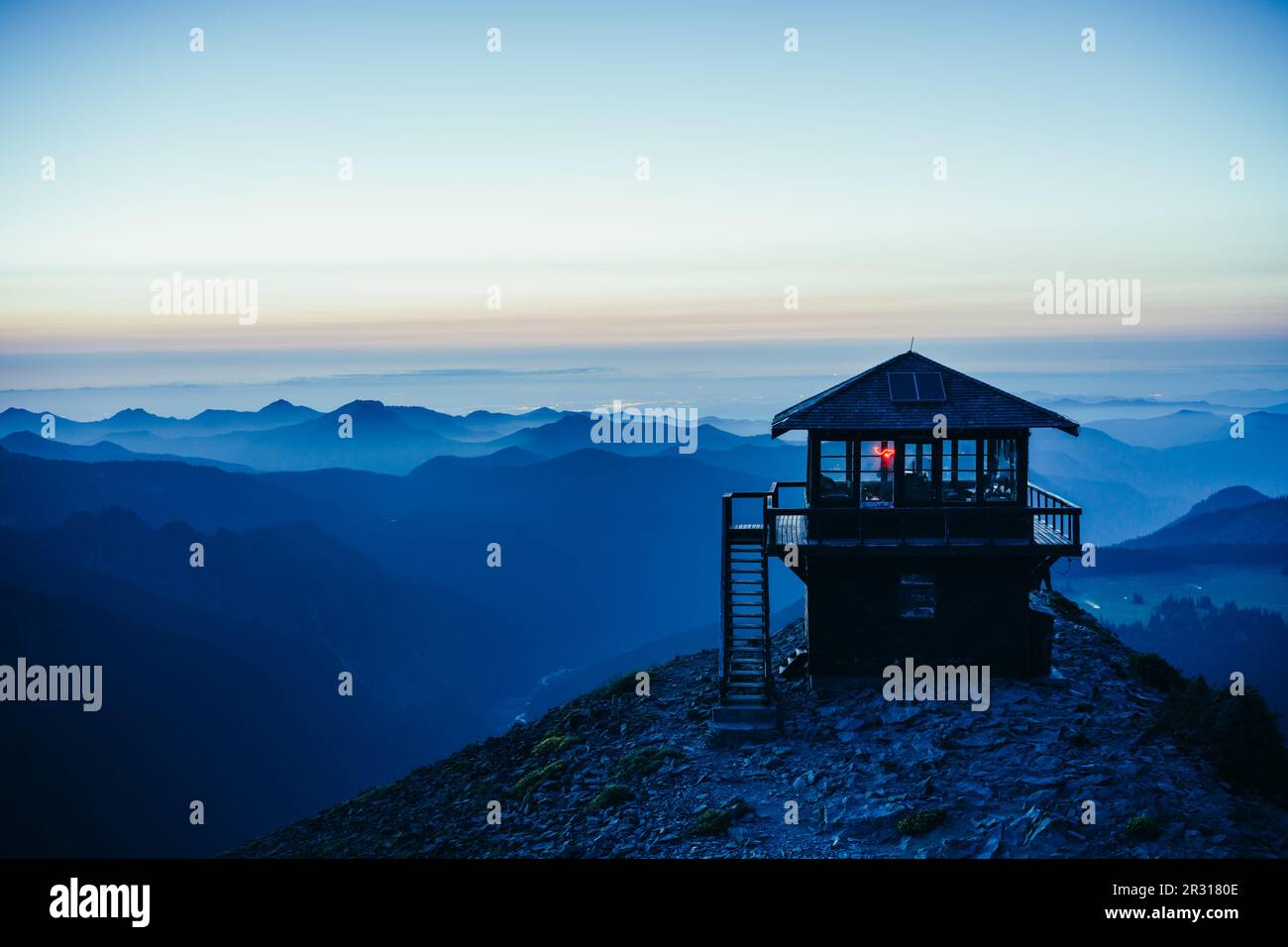 Historic fire lookout at Mt Rainier NP during summer mountain sunset