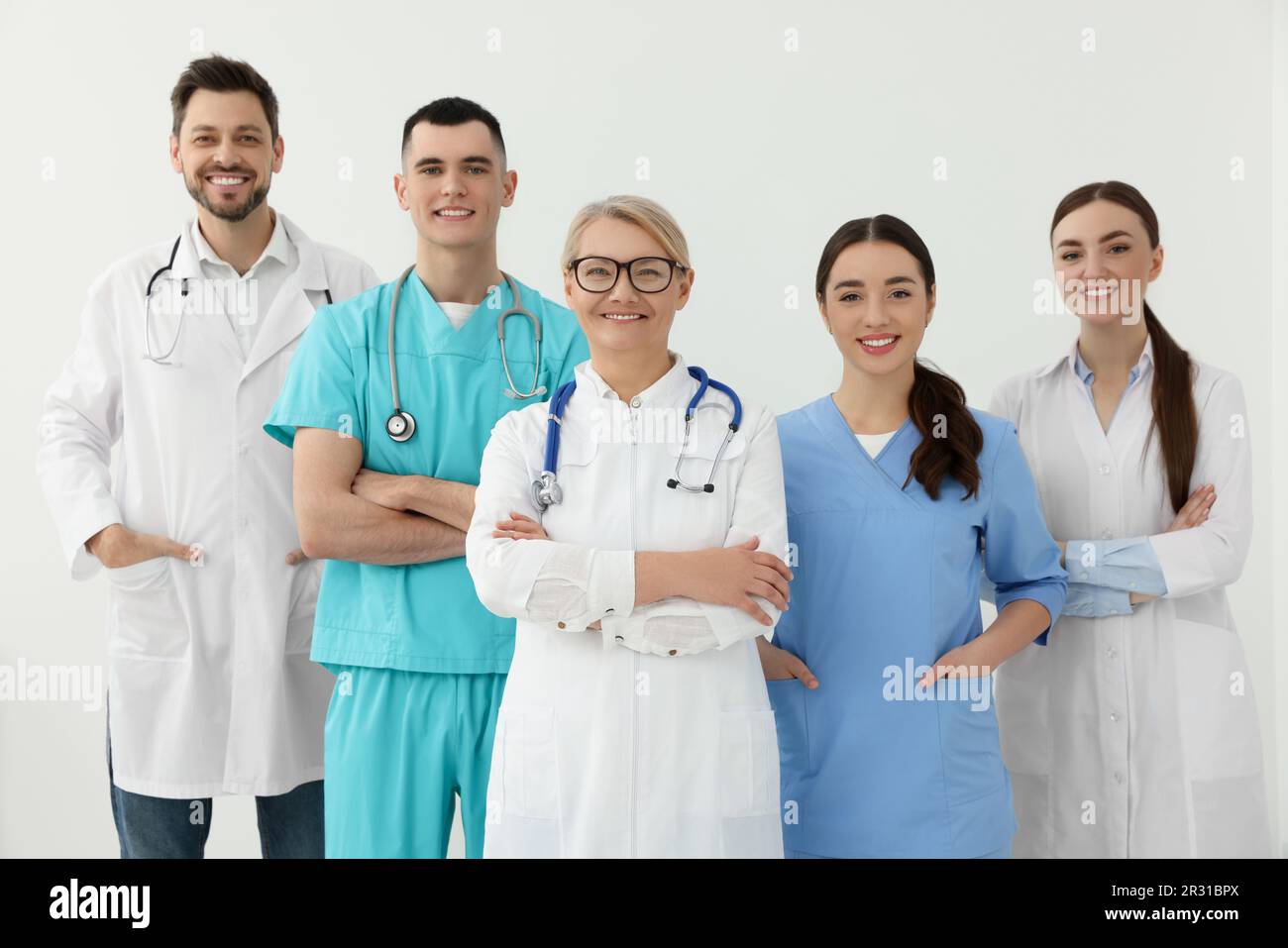Portrait of medical doctors wearing uniforms indoors Stock Photo Alamy