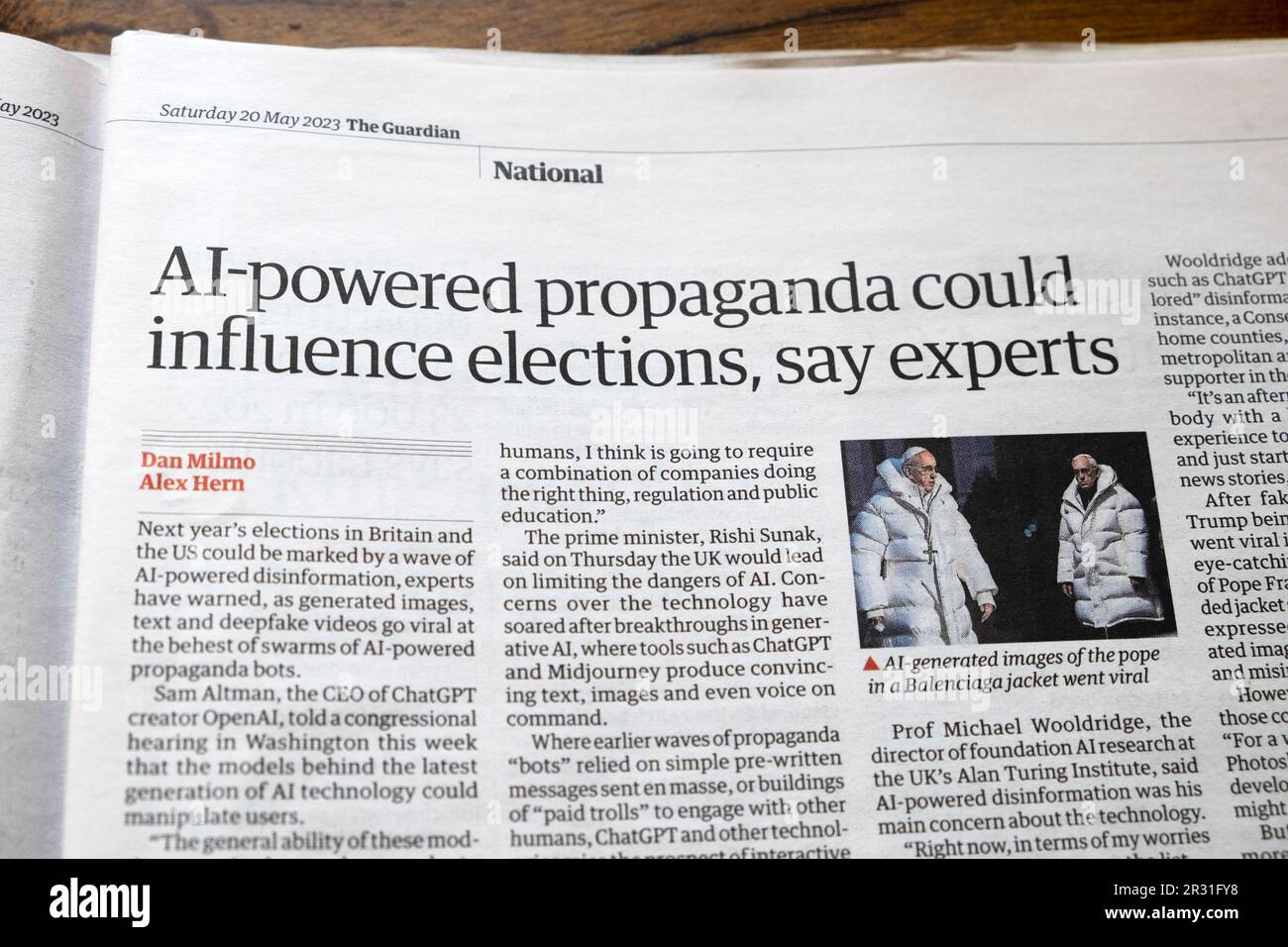 'AI-powered propaganda could influence elections, say experts' Guardian newspaper headline disinformation AI article 20 May 2023 London UK Stock Photo