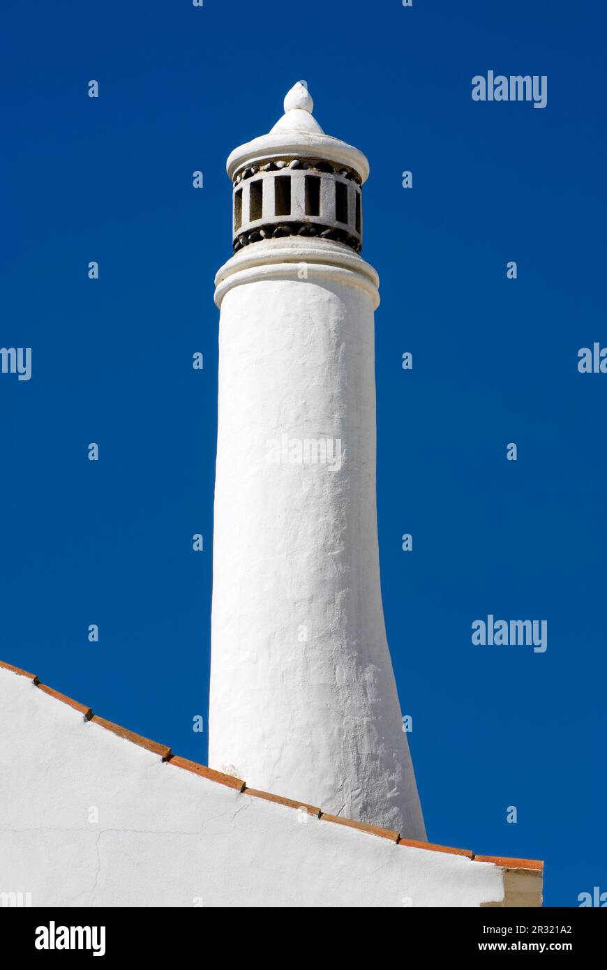 White chimney of a residential house Stock Photo