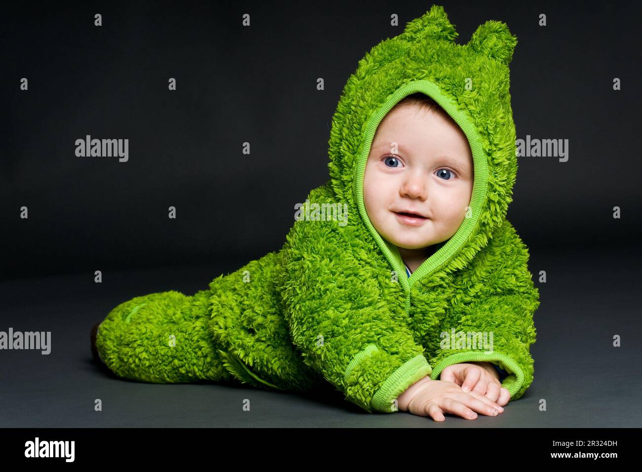 Baby in frog costume Stock Photo Alamy