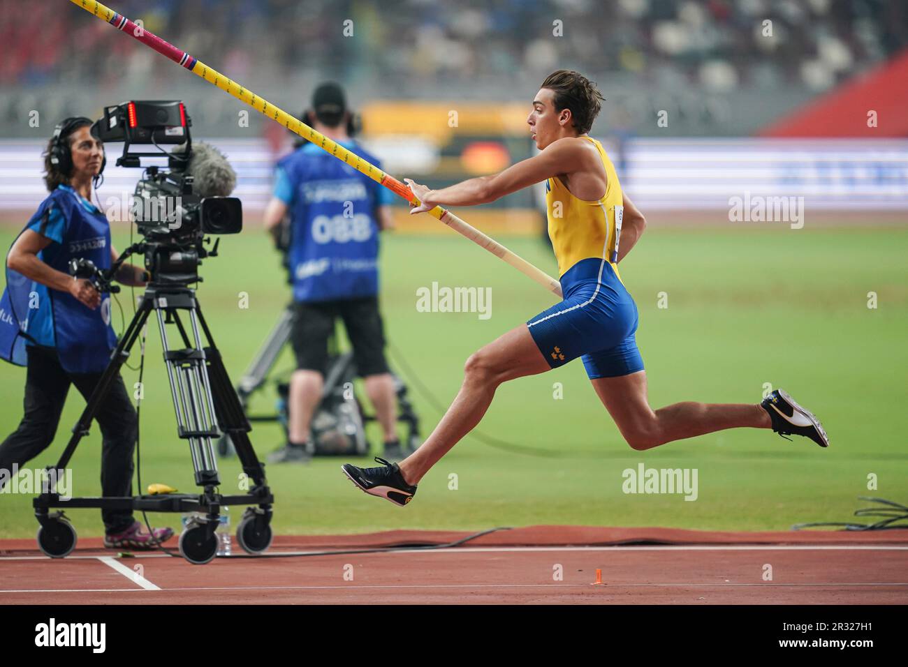 Armand Duplantis participating in the pole vault at the Doha 2019 World
